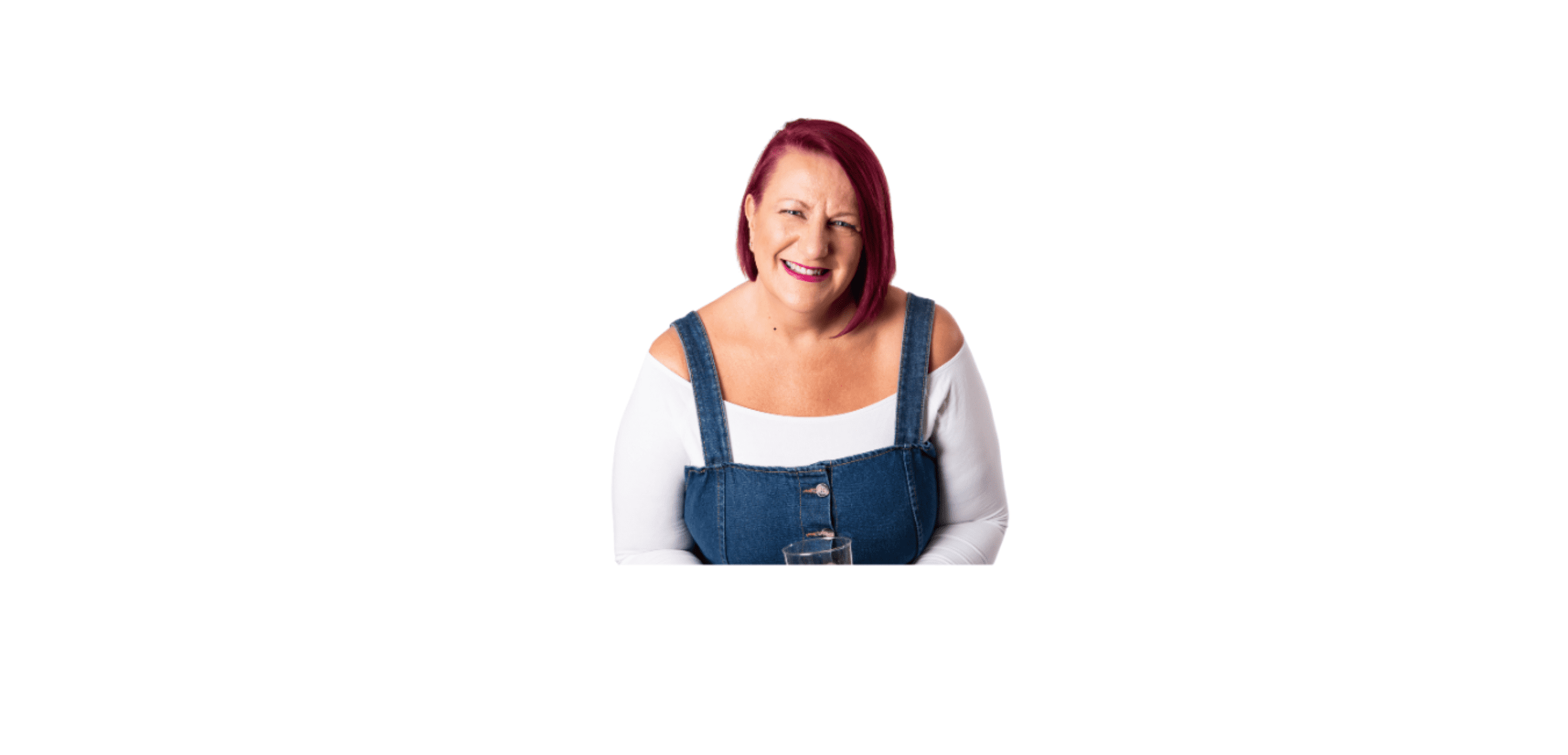 Claire Taylor of Raspberry Flamingo sitting on stool